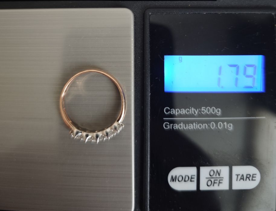 Золота каблучка, з діамантами 0.5 ct, 585 проба.
