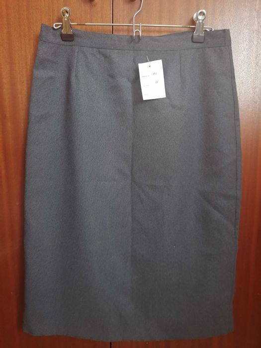 Gray 100% polyester skirt, size 38 with back slit, new64585869779075120