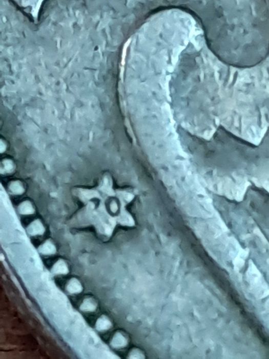 Moedas de 5 e 25 pesetas espanholas raras.