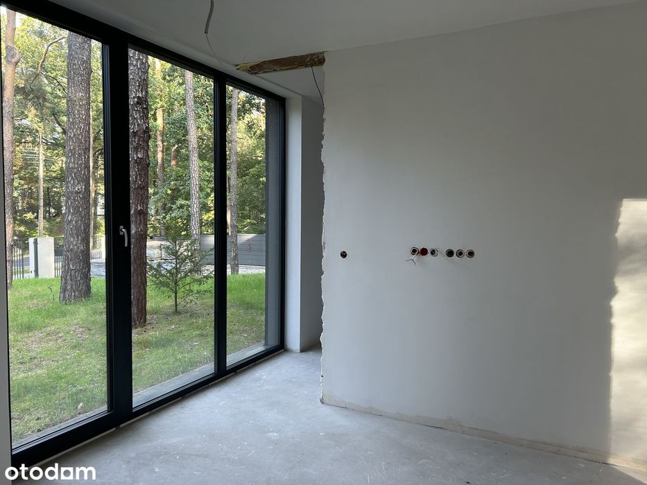 DOM Z PODCIENIAMI autorski projekt modernistycznego domu w Magdalence