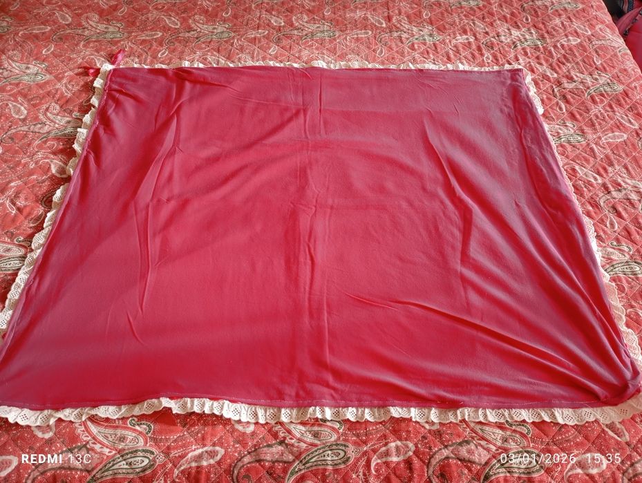 Manta bordada a ponto cruz