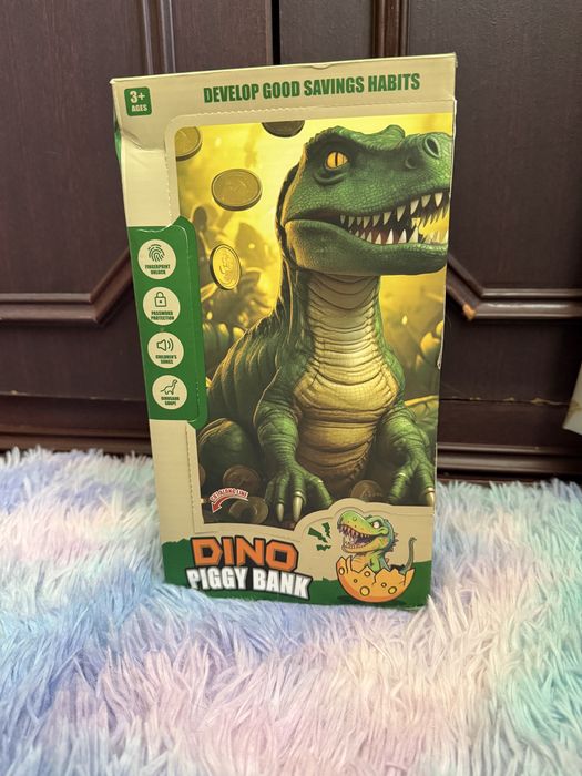 Капилка Dino музыкальная