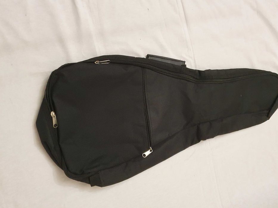 Продам чехол для акустической  гитары.