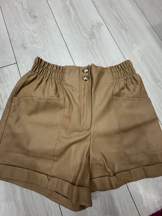 Штани шкіряні і  шорти  коричневі шорти