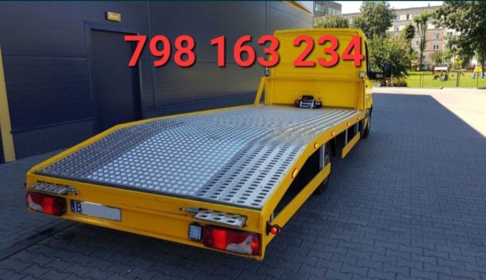 Pomoc Drogowa Laweta Holowanie Transport aut maszyn 24/7