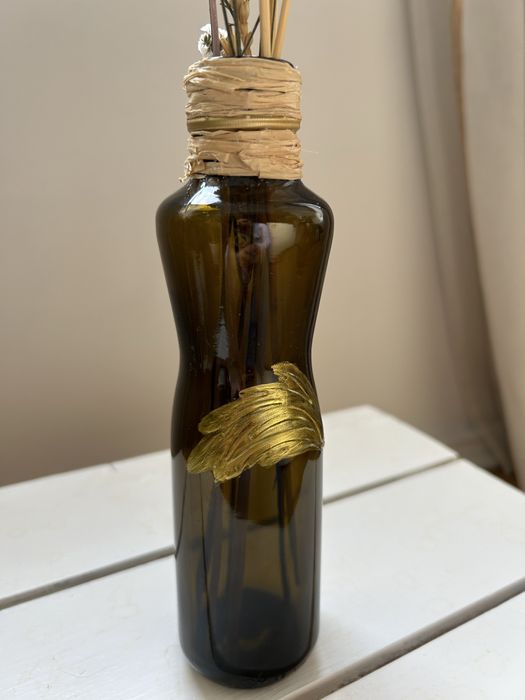 Garrafa decorativa feita de material reutilizádo