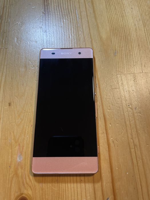 Używany w pełni sprawny telefon Sony XPeria Xa F3111 różowy
