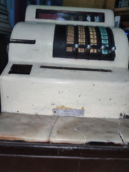 Caixa Registadora antiga a foncionar.