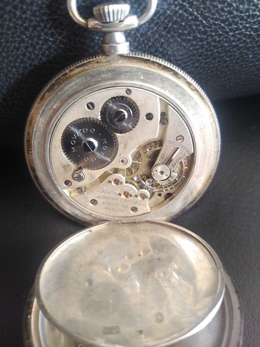Antigo relogio de bolso Movado, em prata. Trabalha muito bem