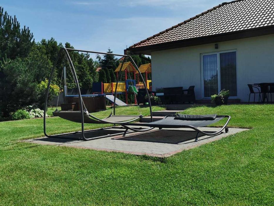 Domek nad jeziorem z linią brzegową, pięknym widokiem, sauną i jacuzzi