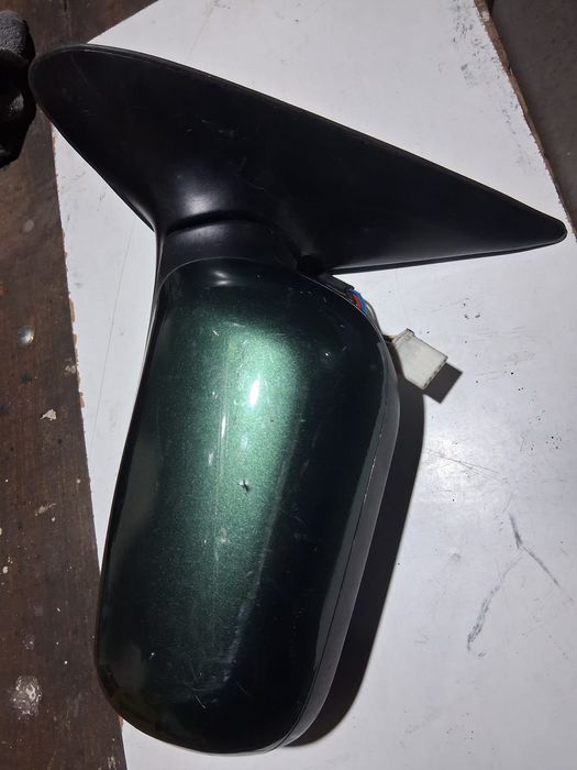 Retrovisor esquerdo Nissan primeira p11