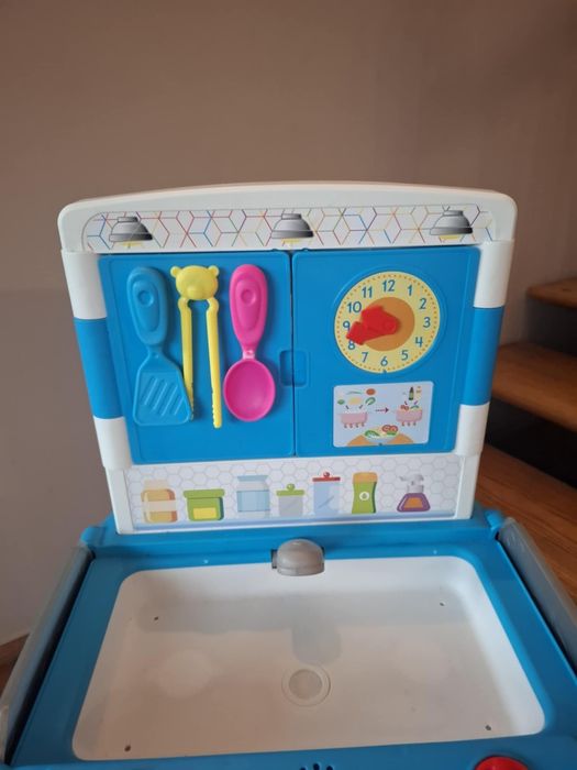 Kuchenka zabawkowa Fisher Price.