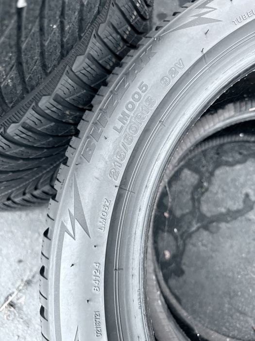215 50 18 Bridgestone LM005 90% 2024 Шини Зима