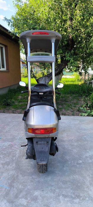 Скутер Honda cabina 90