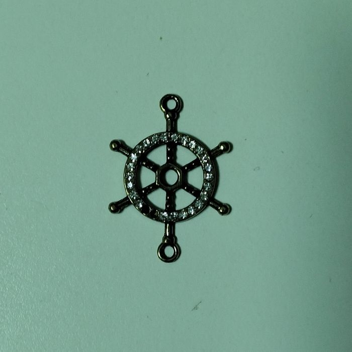 Roda de leme muito antiga  em bronze com pedrasbrilhantes para porta chaves etc etc