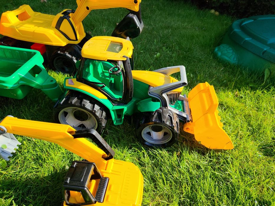 Zabawki ogrodowe koparką traktor przyczepa lena