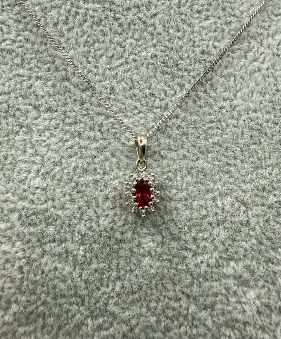 Złoty naszyjnik z rubinem 0,30ct i diamentami 0,10ct Si1/J