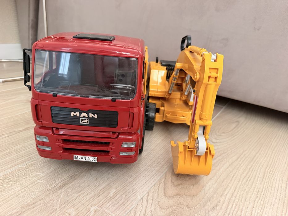 Bruder самоскид MAN з екскаватором Liebherr