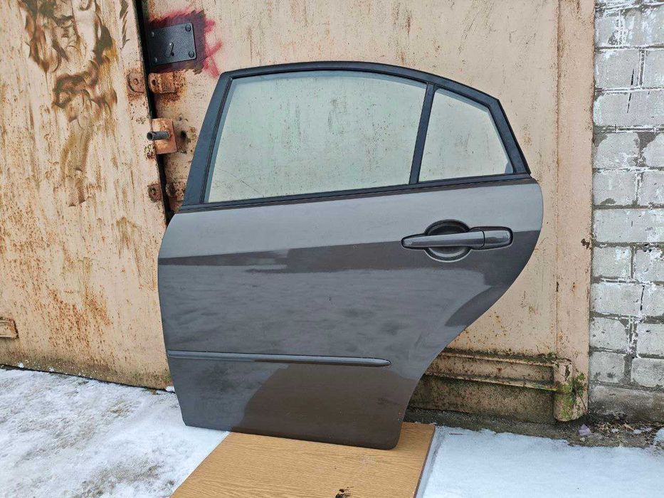 Mazda 6  хечбек дверь левая задняя
