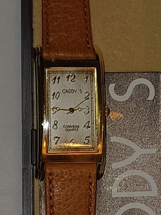 Relógio de pulso em Quartzo e bracelete em Couro