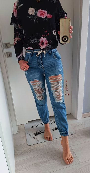 Spodnie jeans z przetarciami dziurami rozm. M