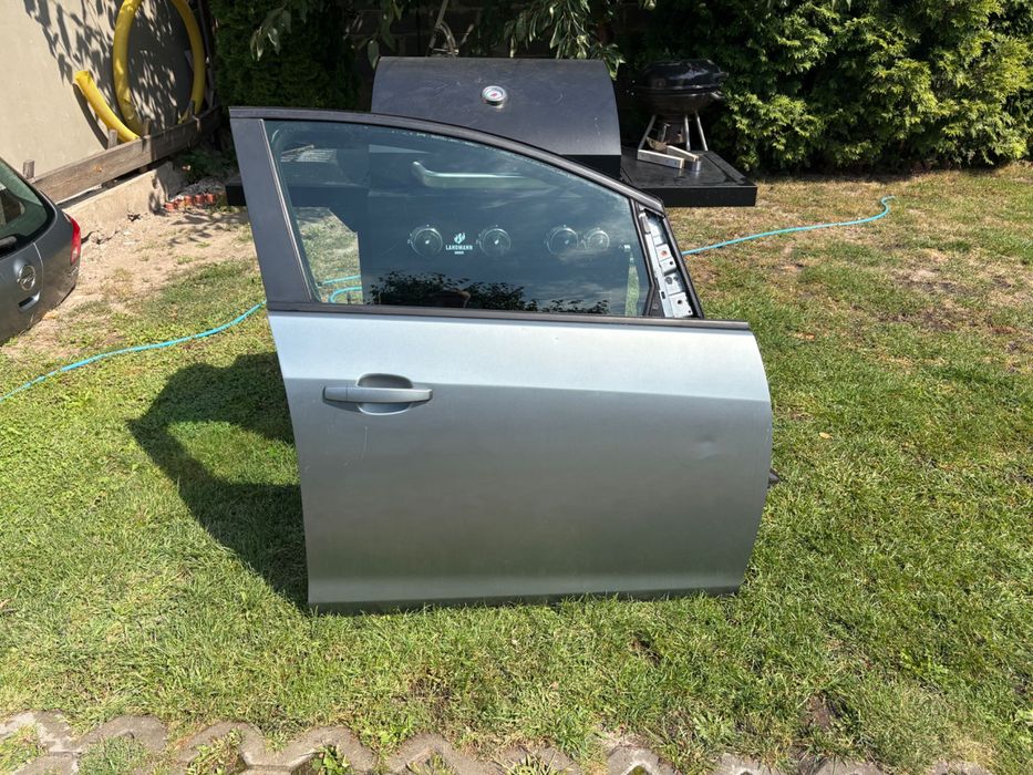 Drzwi Przód Prawe Opel Astra J Srebrne / Szare (Szyba, Klamka, Głośnik)