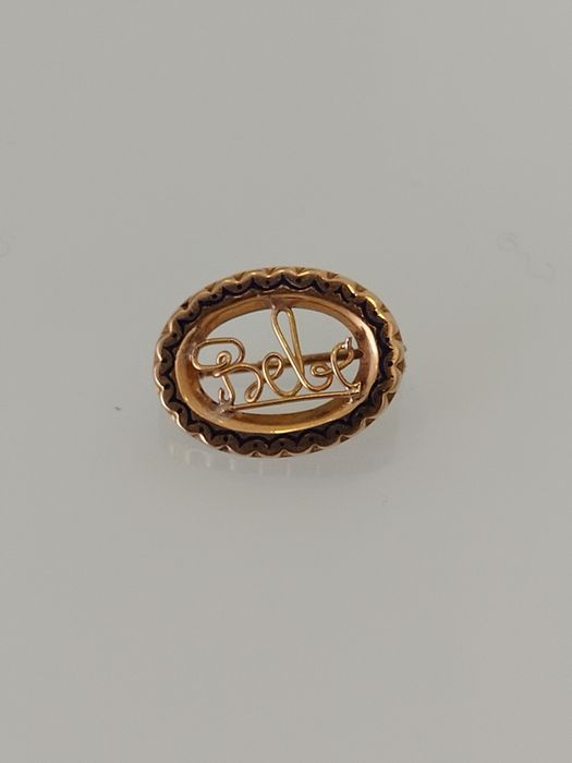 Pregadeira em ouro de 19,2kt