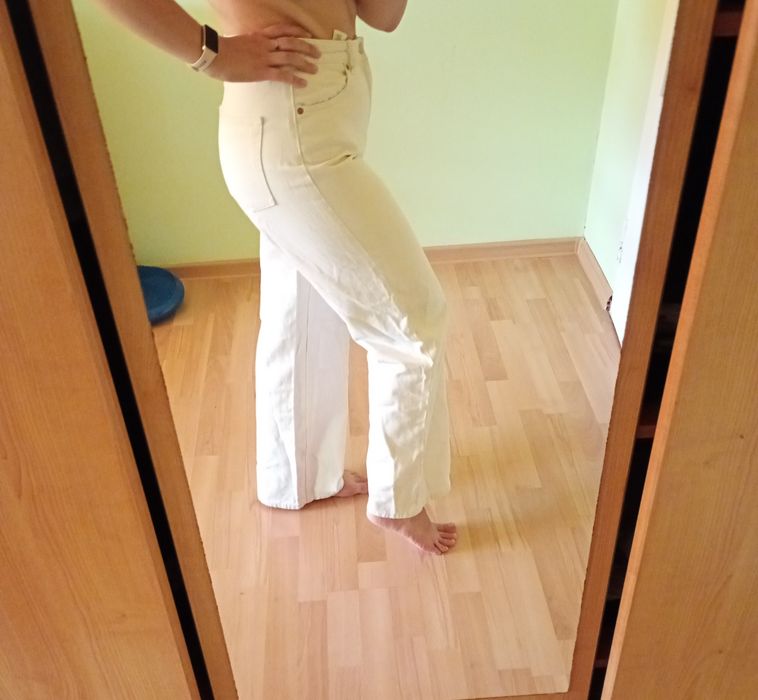 Kremowe jeansy Monki 29 M dzwony szerokie nogawki
Pas 36 cm 
Biodra na