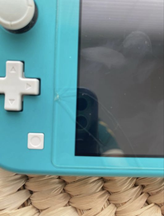 Nintendo switch lite azul/troca