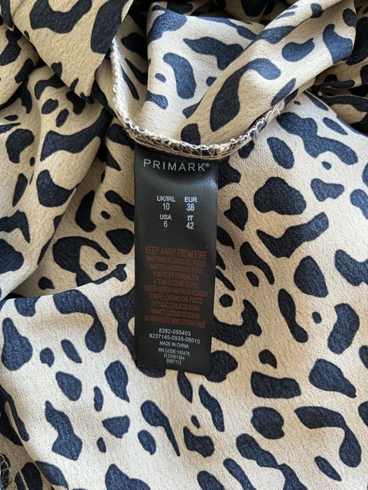 Жіноча леопардова сукня