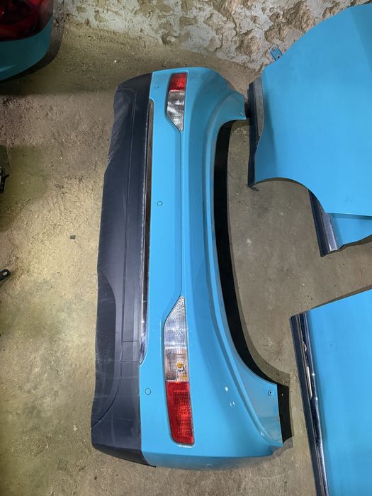 Задний бампер Chevrolet Bolt EV цвет 322Е в сборе