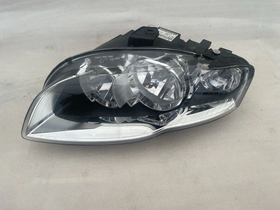 Audi A4 B7 reflektor lewy nowy oryginalny