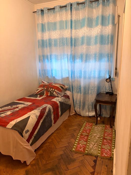 Quarto com casa de banho