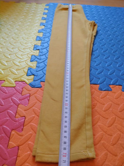 żółte spodnie z meszkiem 134 H&M