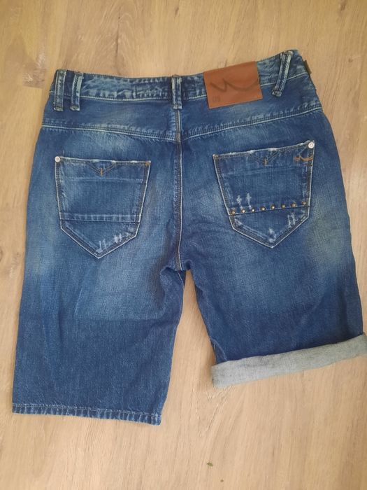 Жіночі джинсові шорти-бермуди