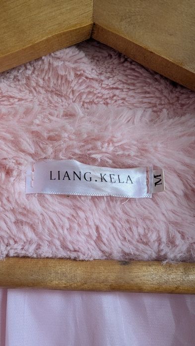 Рожеве плюшеве пальто