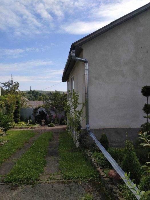 Житловий будинок та земельна ділянка 5,58 сот. м. Перемишляни