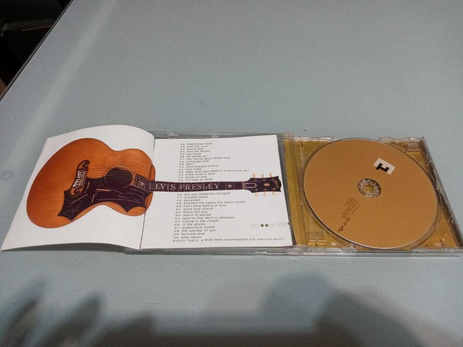 ELVIS 1 CD e 4 dvds em ótimo estado
