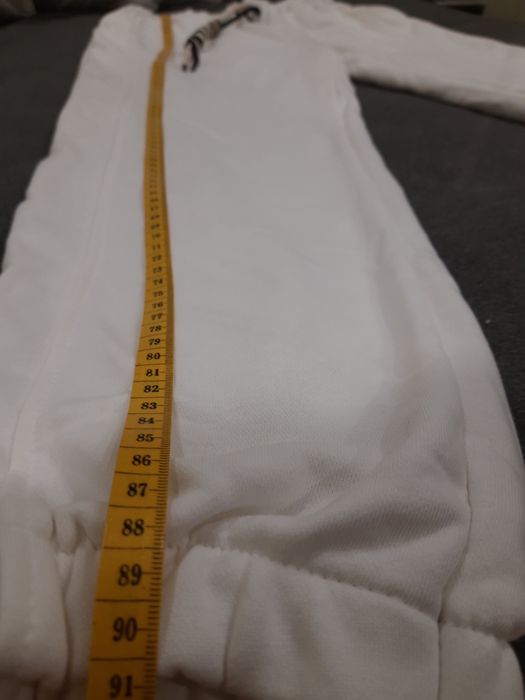 Білі трикотажні штани