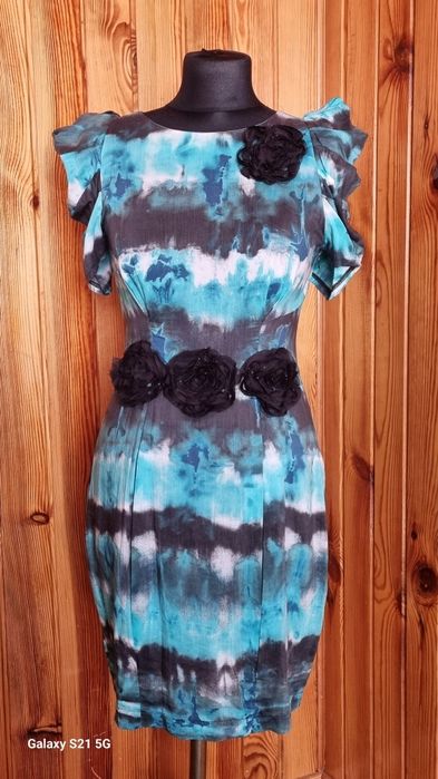 Bastet,kreacja o fasonie koktajlowym,rozmiar 38