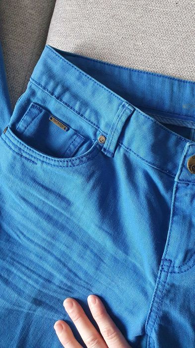 Niebieskie spodnie jeansy rurki slim fit Orsay 38