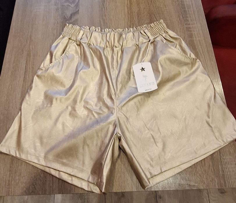 Nowe złote skórzane spodenki Livans z metką.
