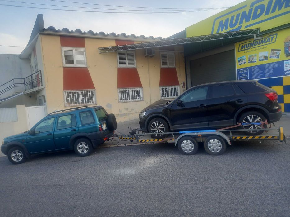Serviços de  transporte de viaturas