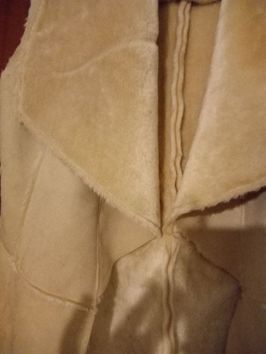 Colete pele de pêssego forrado em pêlo