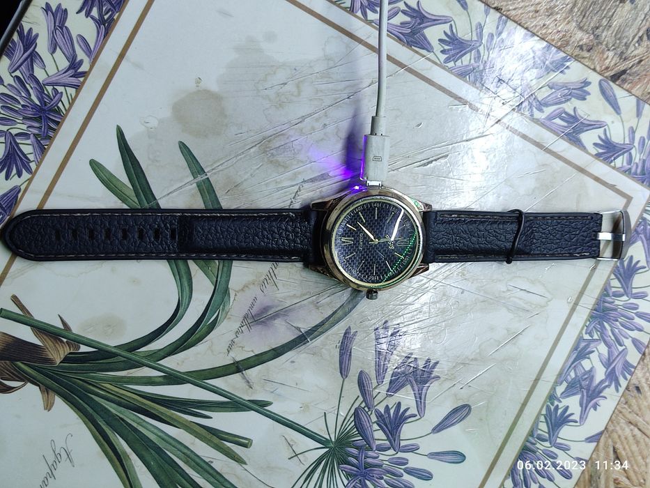 Часы с зажигалкой,зарядкой.