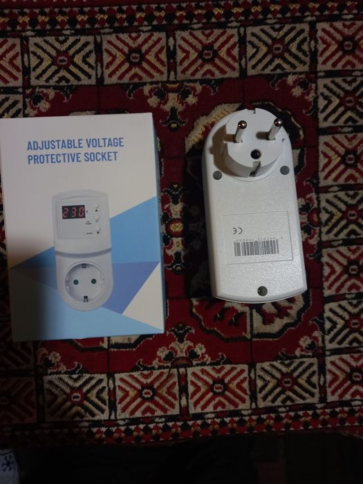 Реле напруги в розетку