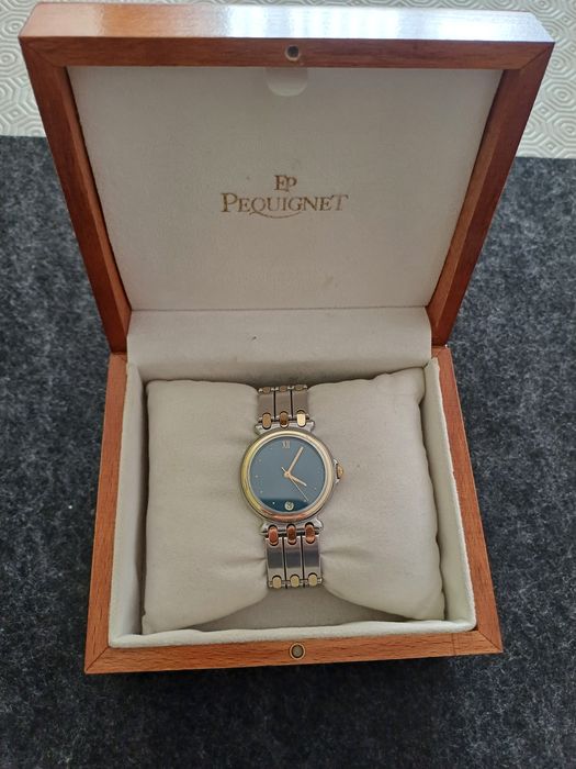 Relógio da marca Emile Pequignet em aço e ouro