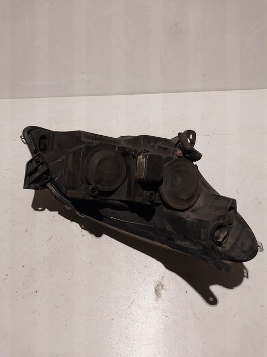 Opel astra H III 3 lewa lampa przednia przód reflektor lewy