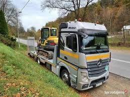 Pomoc drogowa Katowice Laweta 24 Transport maszyn i koparek slask