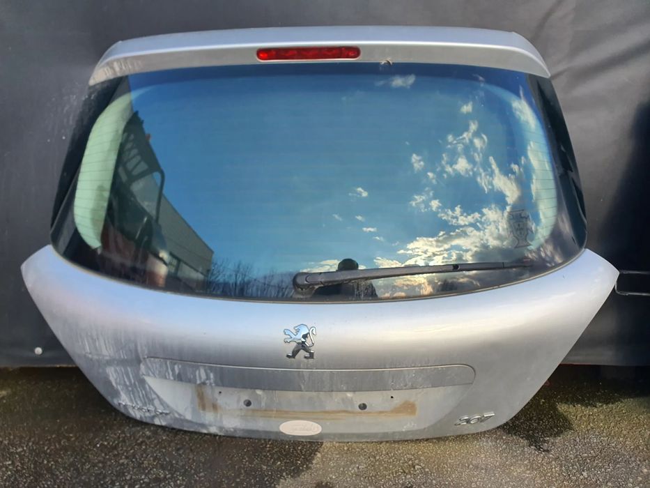 TAMPA MALA PEUGEOT 207